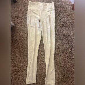 Yellow Victoria Secret leggings with pockets.